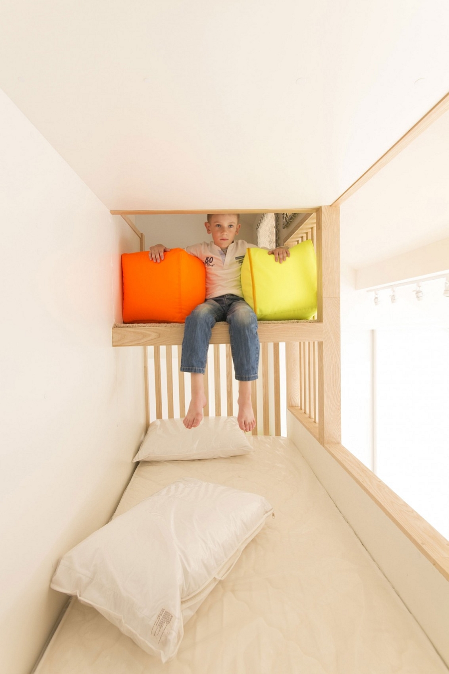 Top bunk of the elegant kids’ bunk beds with ample room