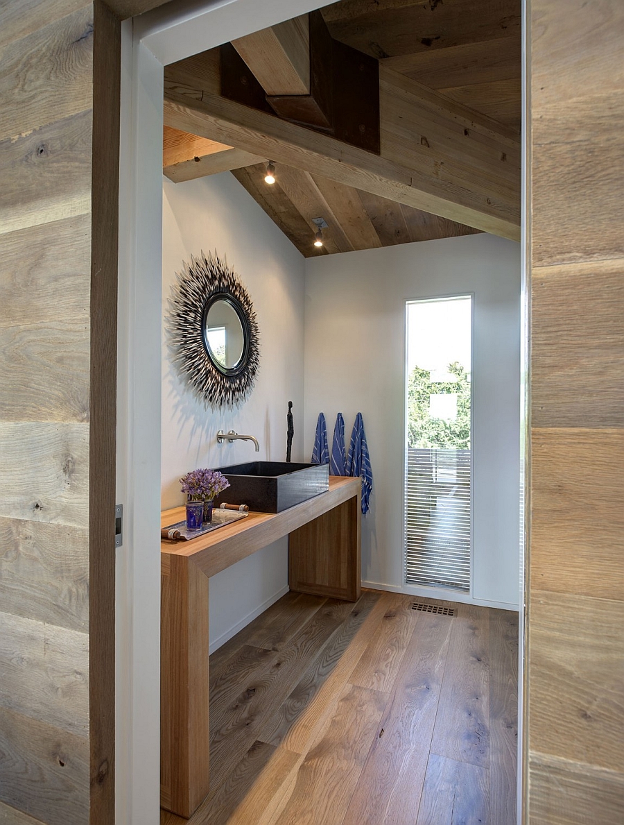 Wood brings some much needed warmth to the steel and glass home