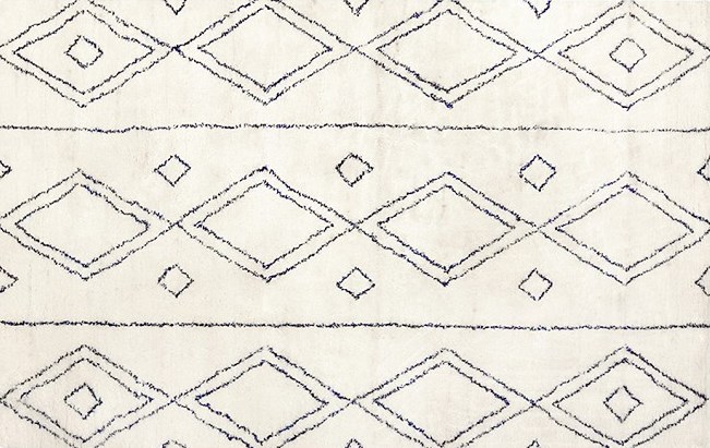 Navy and white diamond-pattern rug