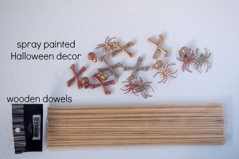 Spray paint the plastic skulls and spiders for a chic Halloween look!
