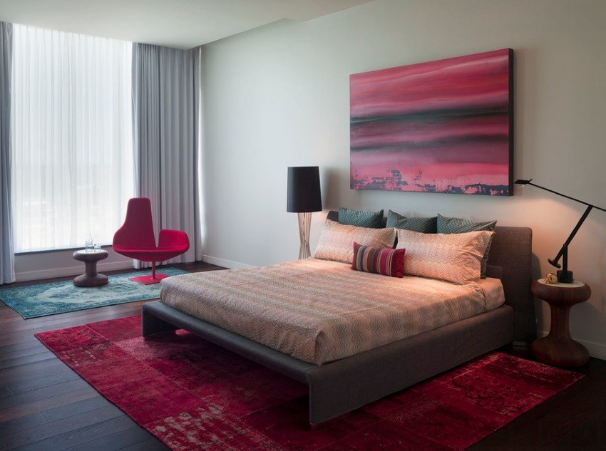 Overdyed rugs in a modern bedroom