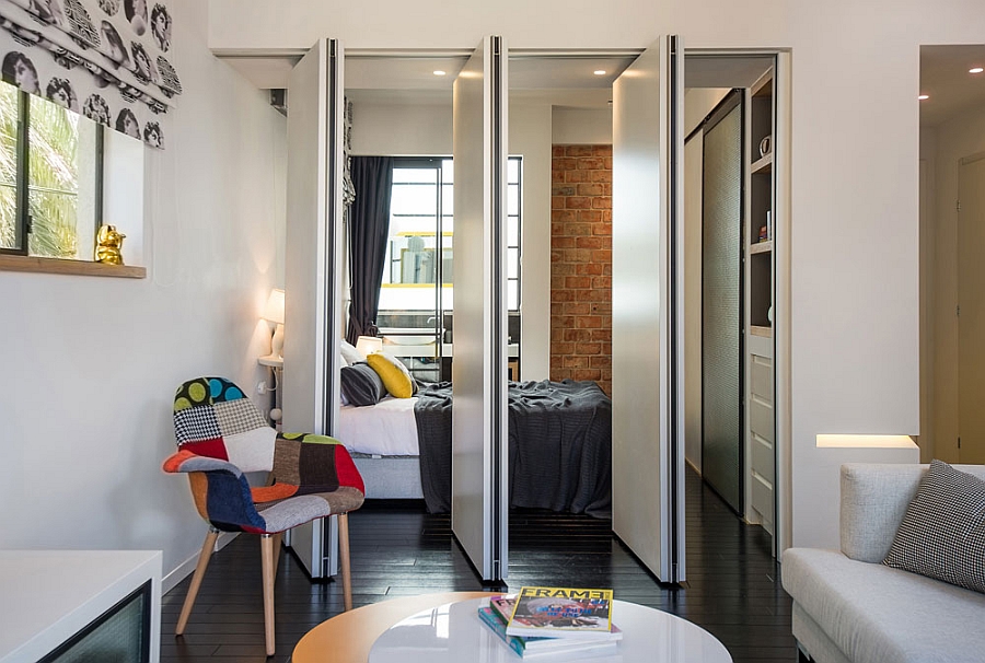 Foldable dividers that separate the living room and the bedroom
