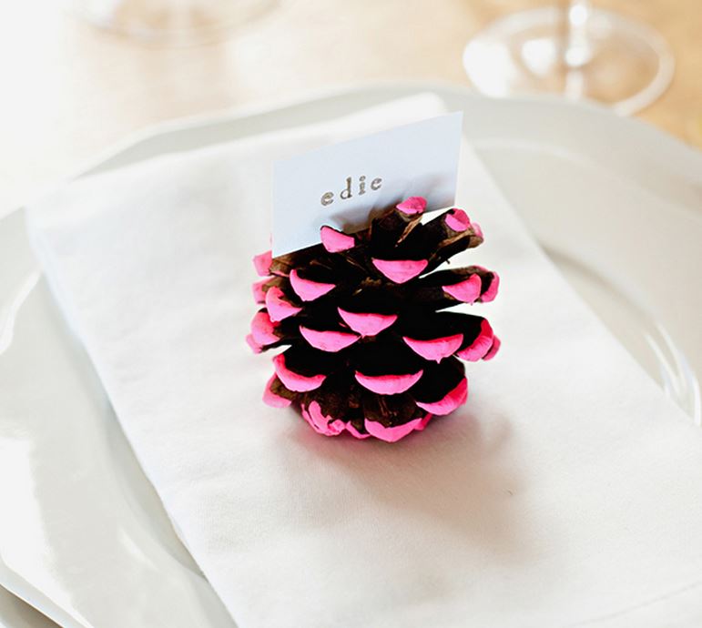 Neon pine cone placecard holder from Camille Styles