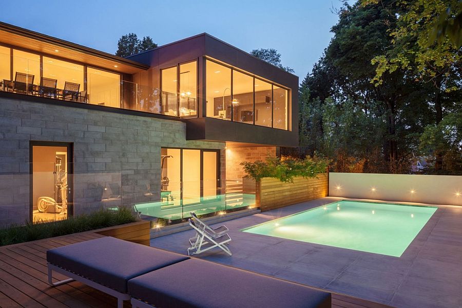 Intriguing pool and sunken deck design adds to the appeal of the Canadian home