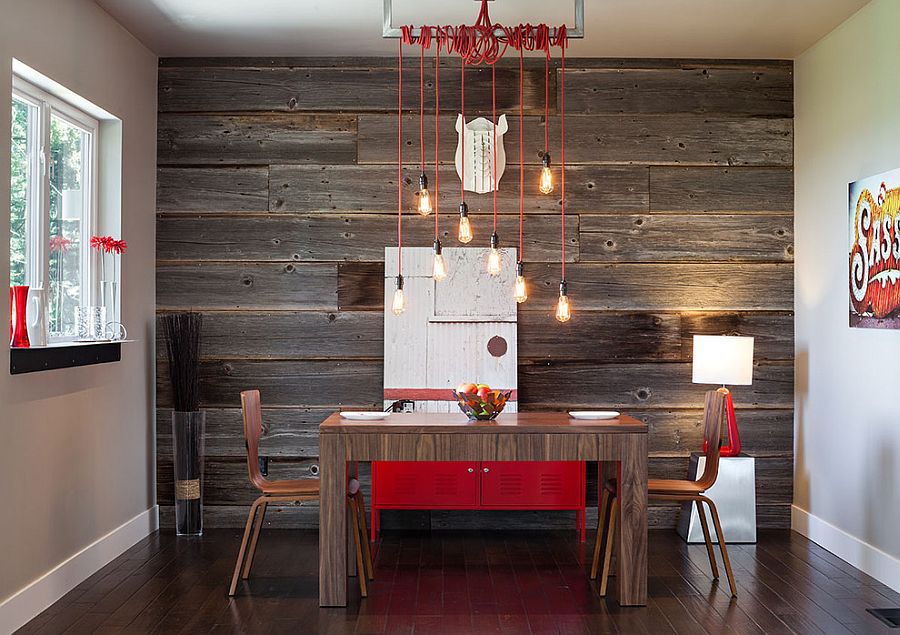 Feature wall in the dining room with stripes from reclaimed wood