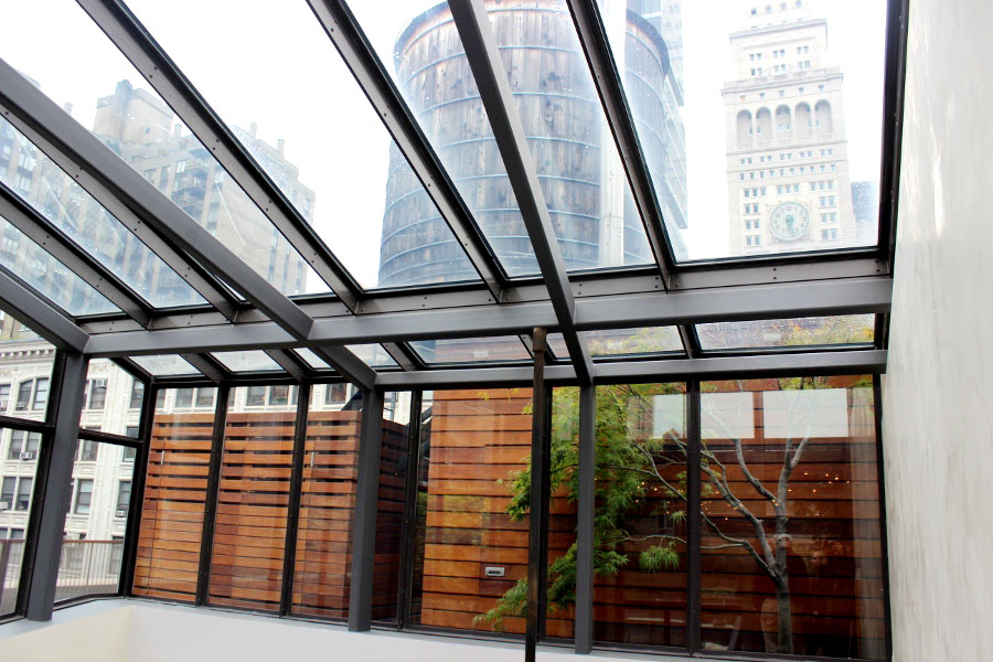 Glass Atrium in Violin-Inspired Penthouse