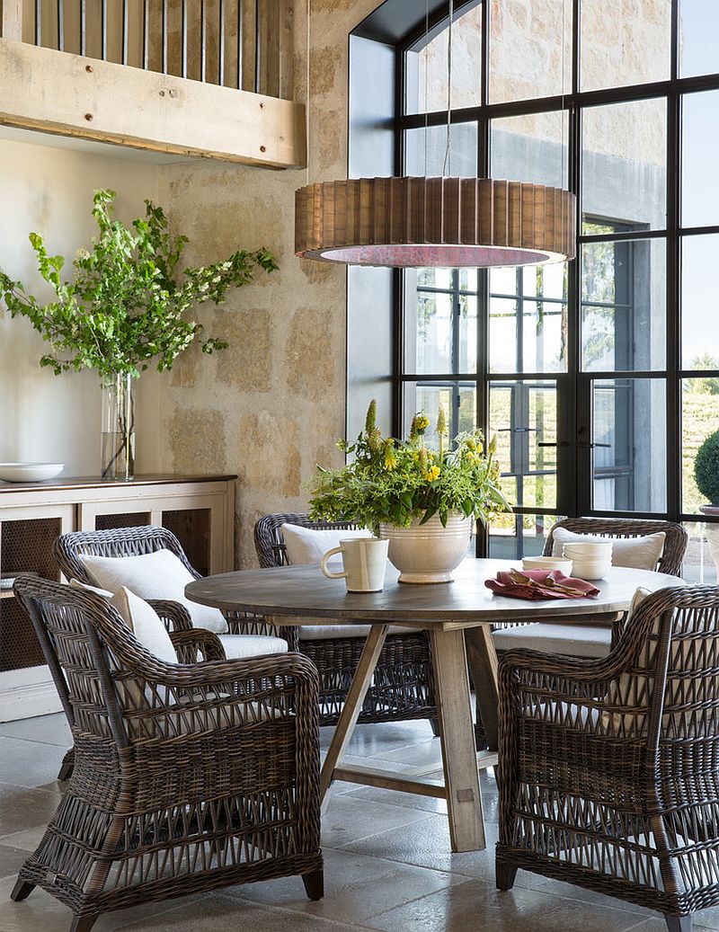 Use of natural materials for the dining table and chairs adds to the Farmhouse style