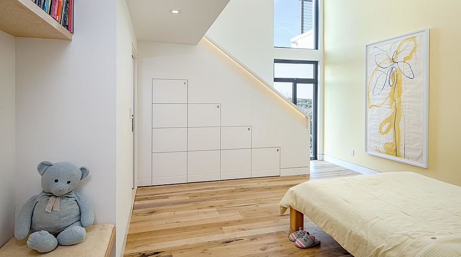 Contemporary kids’ bedroom with smart storage solutions