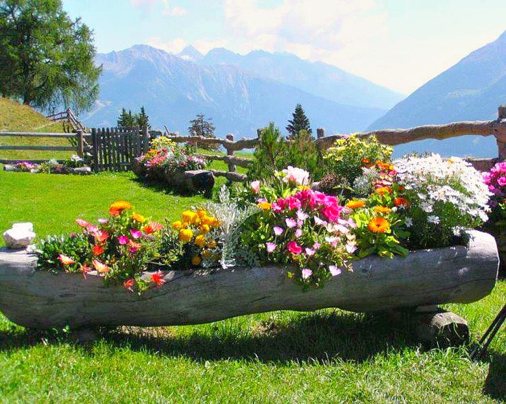 Using local found woods for planters is especially apt when your location is far from a garden center or store
