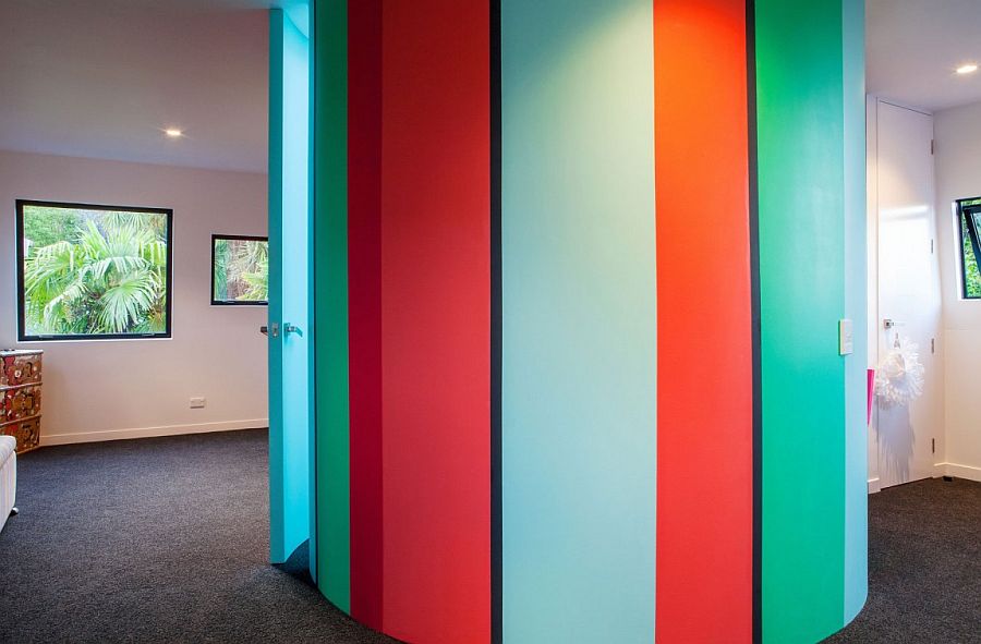 Colorful tube structure acts as the kids’ bathroom