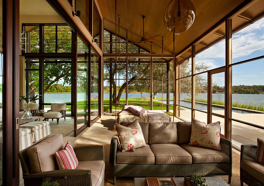 Suspended bed and sliding glass doors for the sunroom with lake views