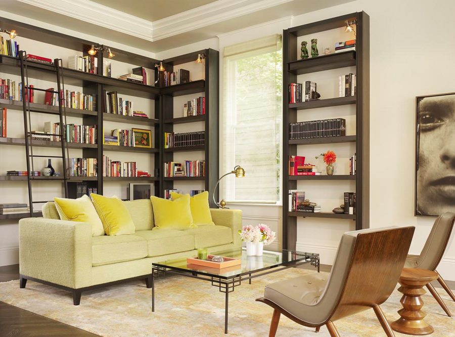 Bookshelf spotlights near the ceiling in a living area