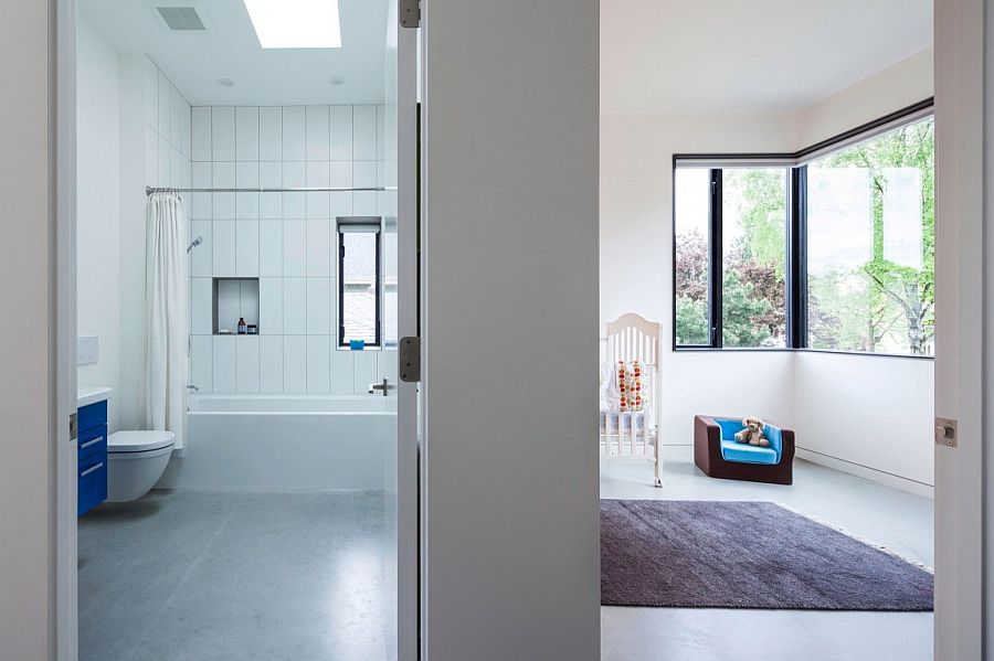 Kids’ room and bathroom of the economical Vancouver home in white