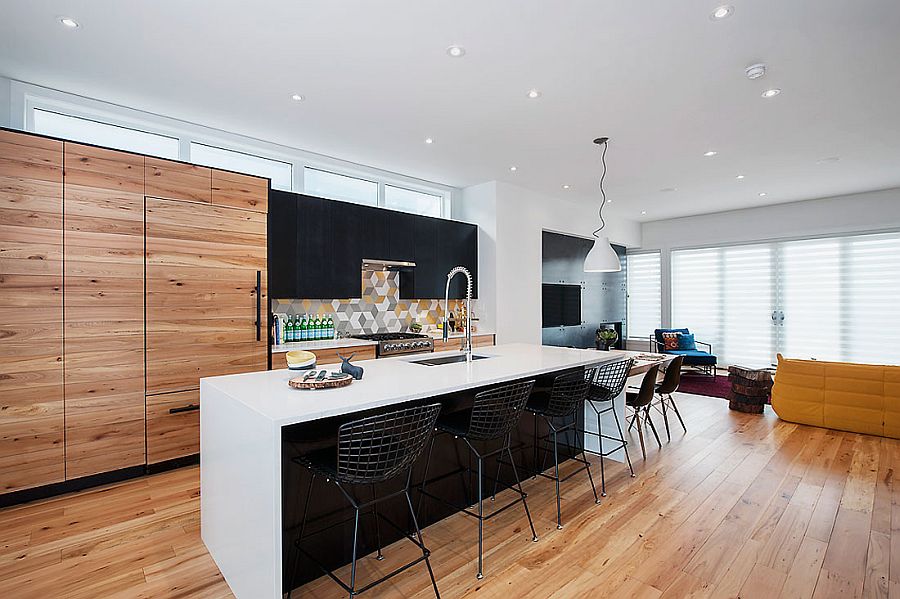 Kitchen, dining area and TV room combine to create the family zone on the top level
