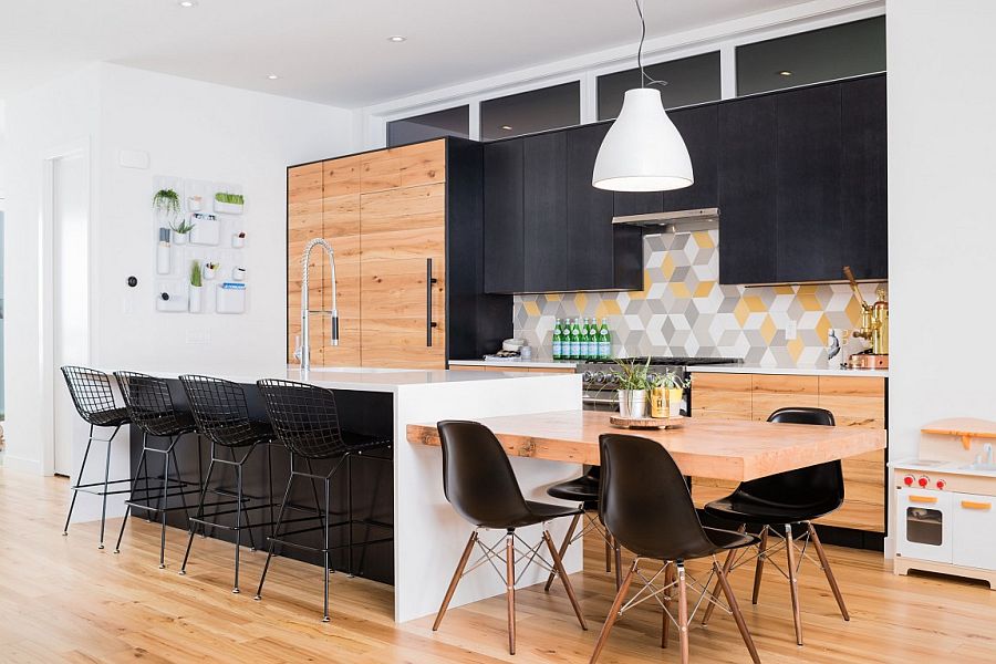 Kitchen with dark cabinets, geometric tiles and a smart island