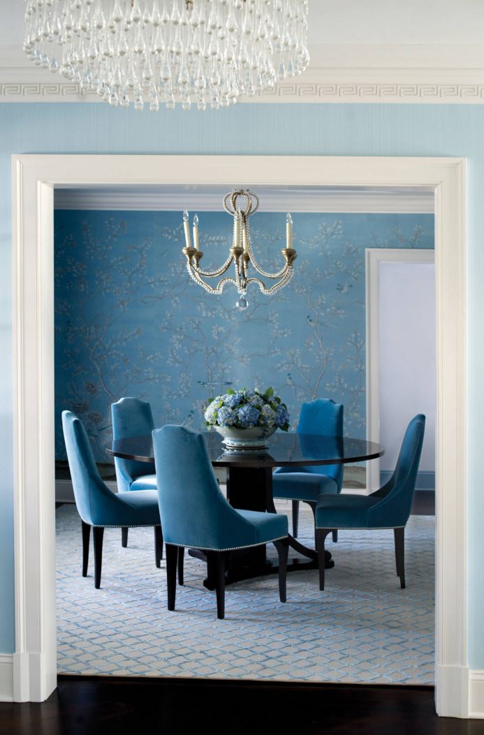 Blue walls lead to a blue dining room
