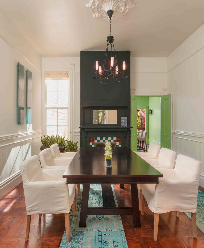Dining room with a view to a green room