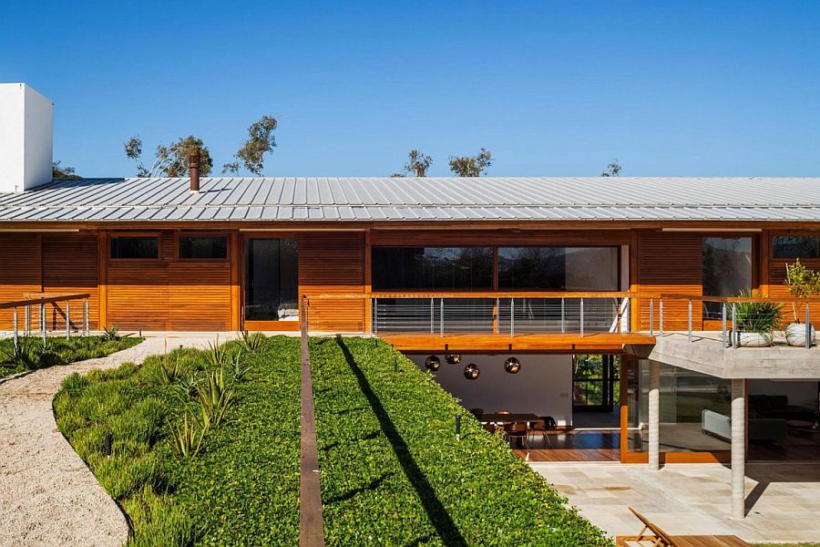 Fabulous walkway adds to the charming exterior of the Brazilian home