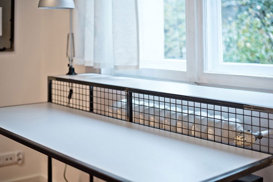 Design of the desks combined with radiator covers for a space-savvy solution