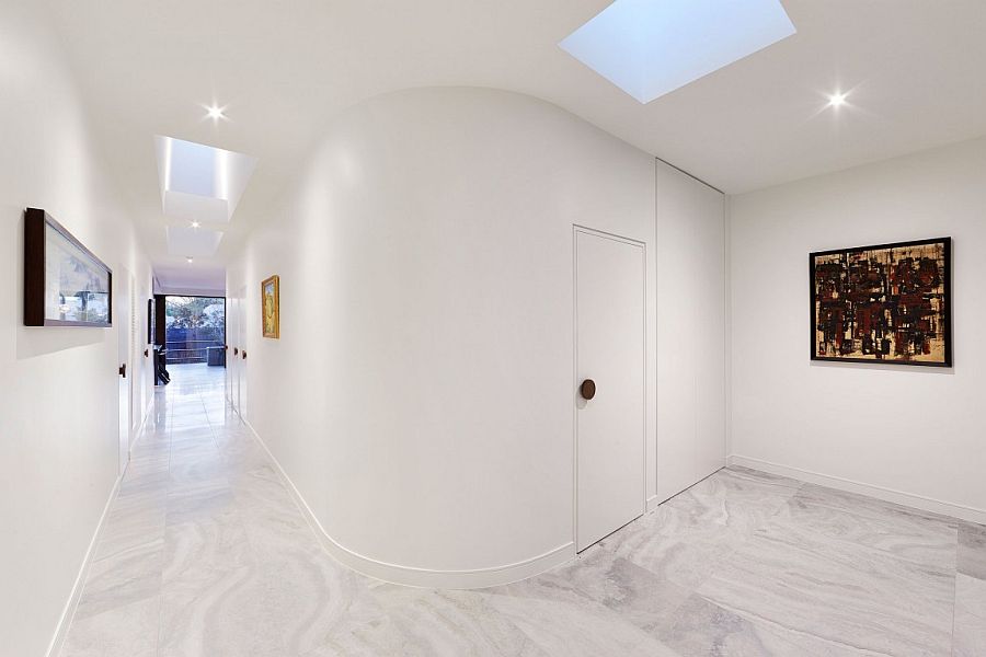 White corridors with curved wall and skylights