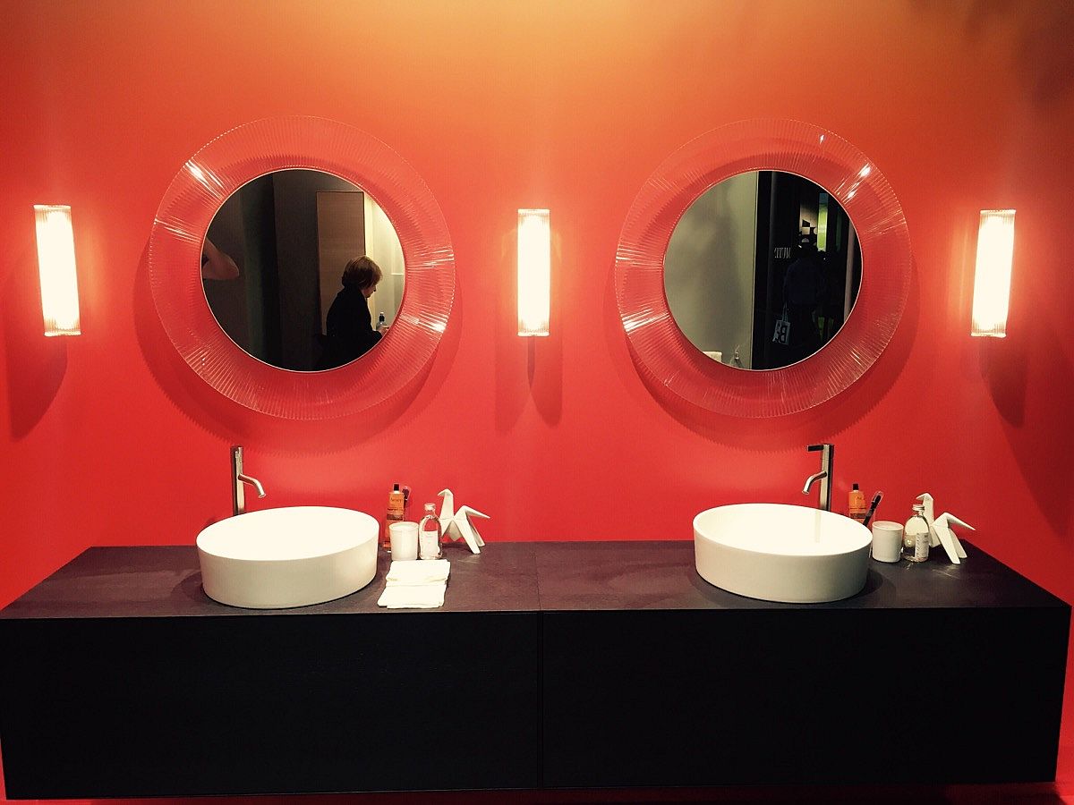 Oraneg and black is a color scheme you can try out as well in the bathroom