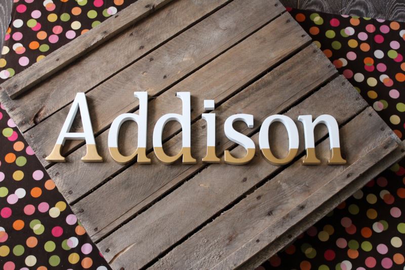 Paint-dipped wooden letters from Etsy shop Cucumber Apple Studio