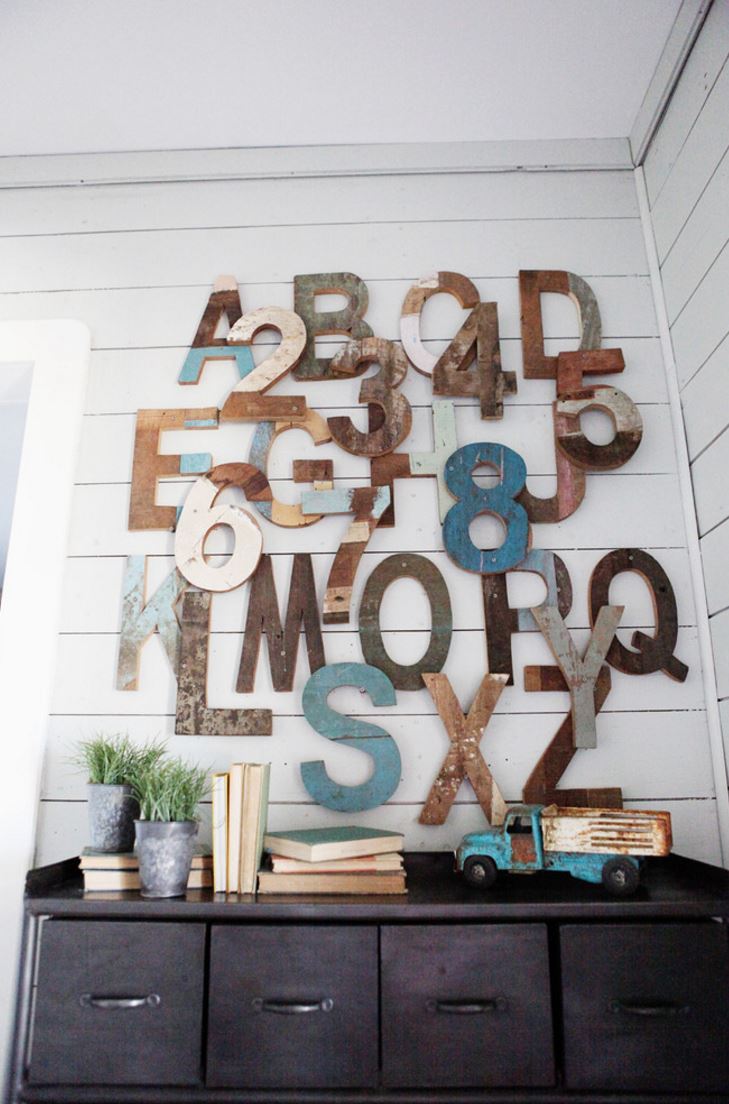Wooden letters create a modern rustic touch