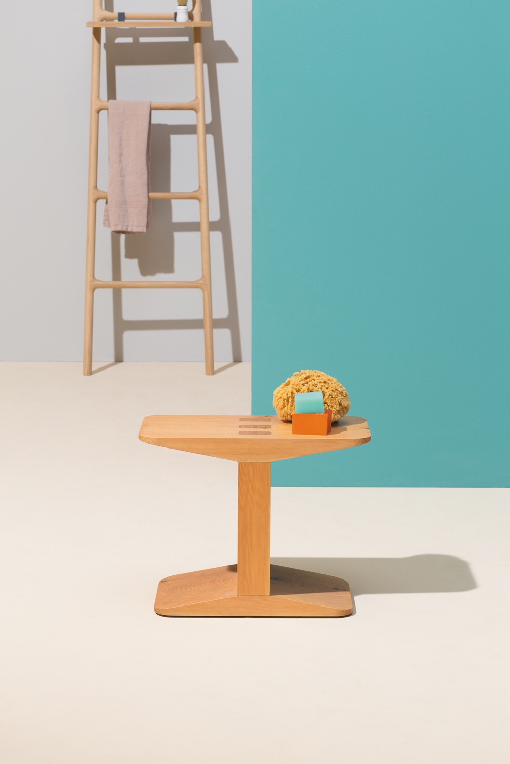 The Centanni solid larch stool designed by James Irvine. Image via Klat.