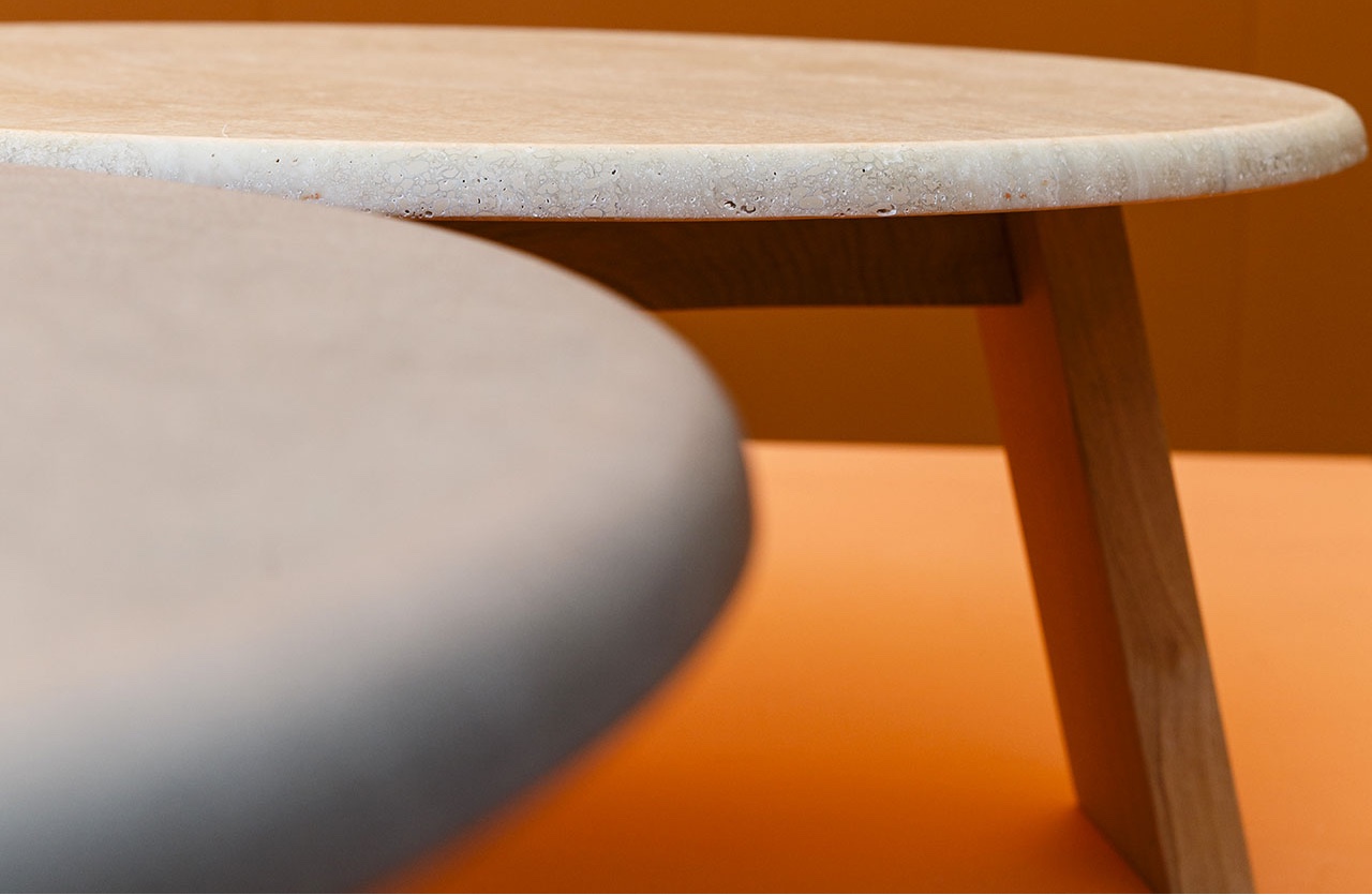 The Maya side table, designed by Lars Beller Fjetland, combines stone and wood. Image via Domus.