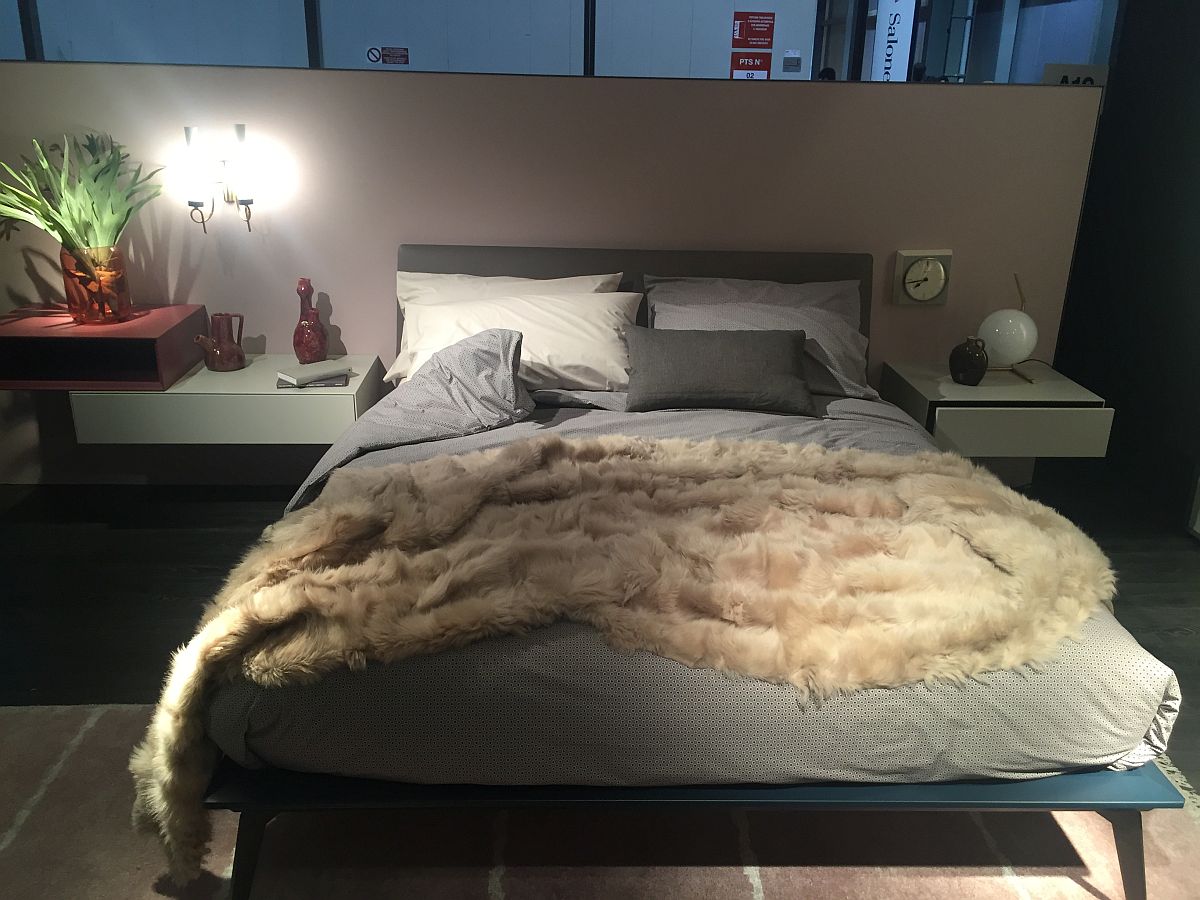 Sleek bedside units serve beautifully as nigtstands in the small bedroom