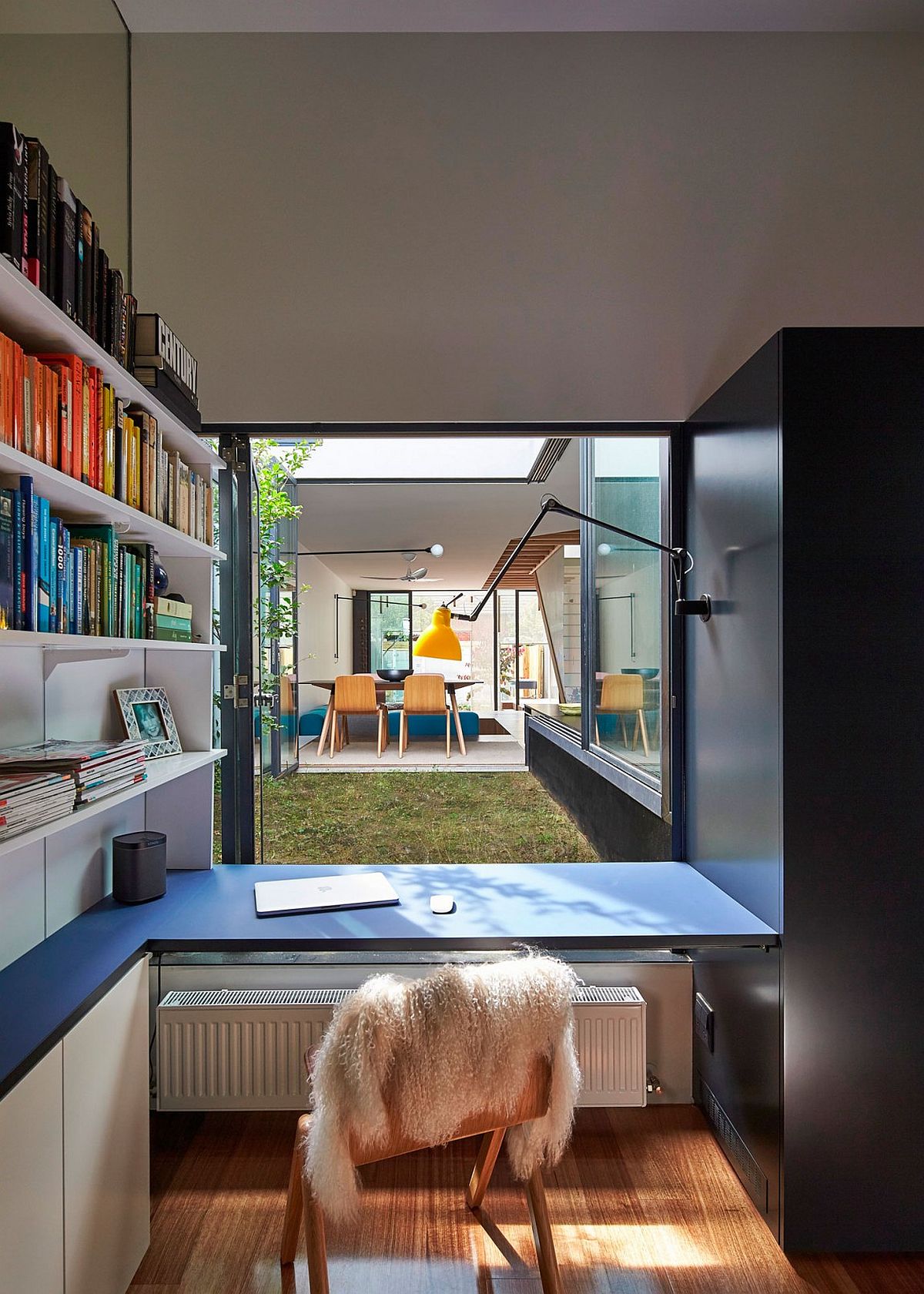 Home workspace connected with the small yard outside