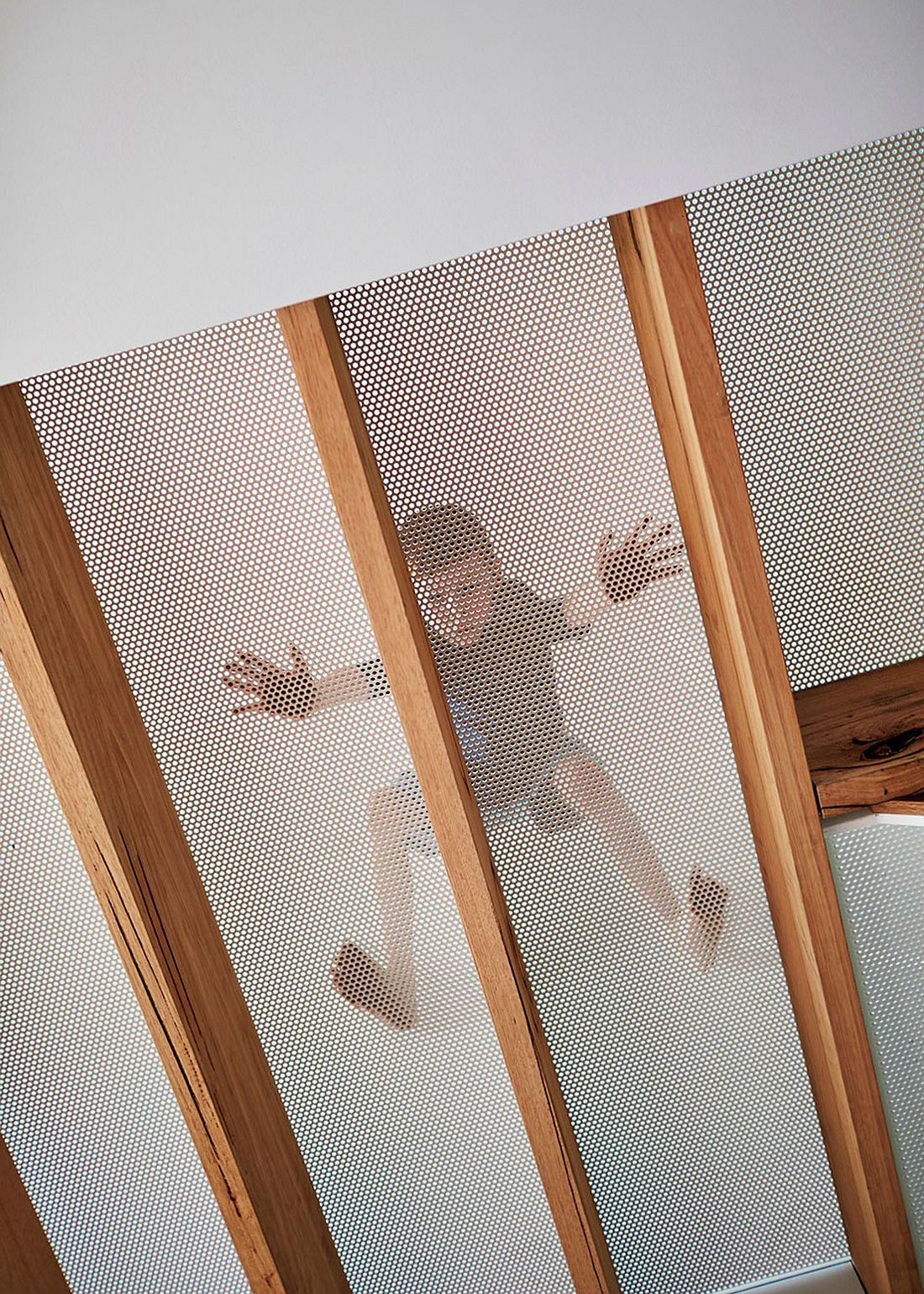 Let natural light from from one level to next with perforated metal