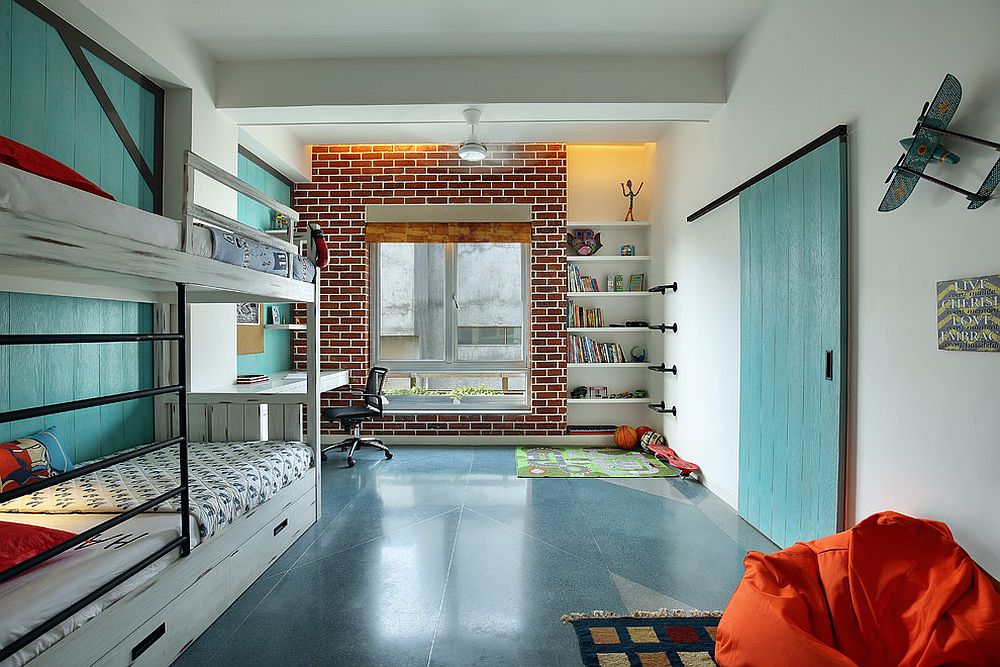 Modern kids’ bedroom celebrates the beauty of the barn door