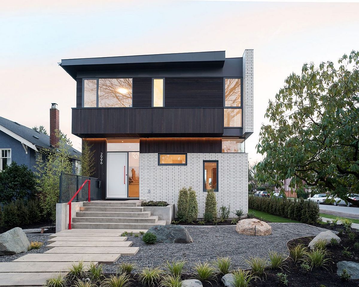 Dark cedar coupled with white bricks to create a unique facade