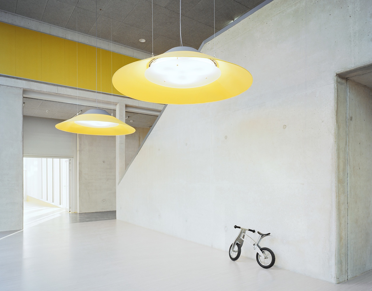 Clean and minimal space at Kindergarten Kunterbunt.