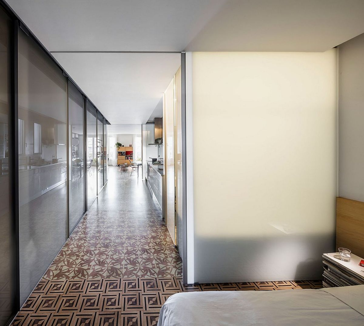 Narrow hallway connecting the bedroom and living area