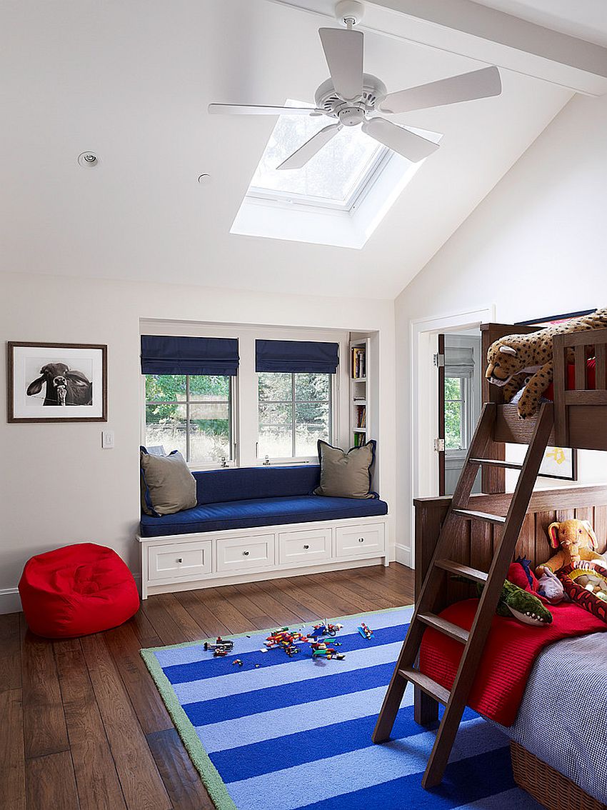 Kids’ bedroom with bunk bed, a lovely window seat and skylight