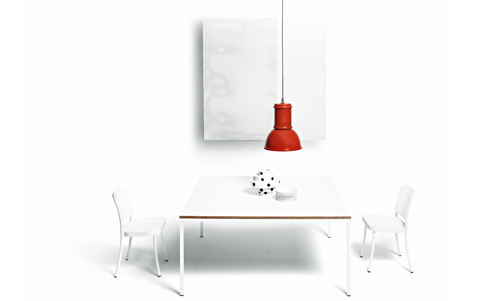 Silver chair by Vico Magistretti for De Padova.