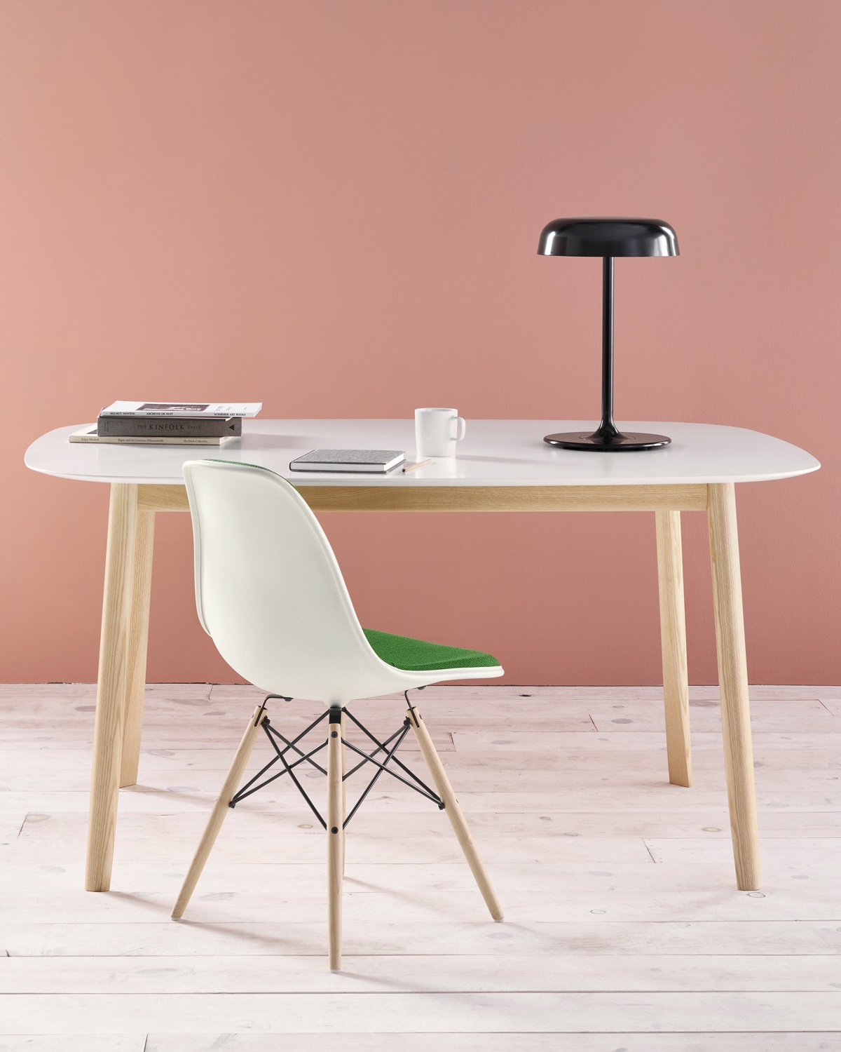 The Eames Molded Plastic Chair makes the prefect office seat: simple, clean and classic. Image © 2016 Herman Miller, Inc.