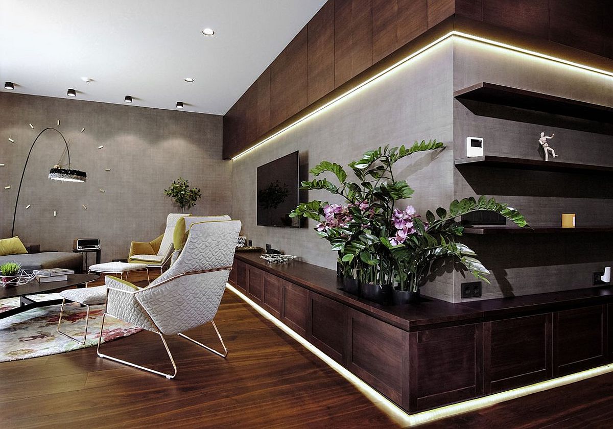 Gray walls in the living room allow you to add bright accents with ease
