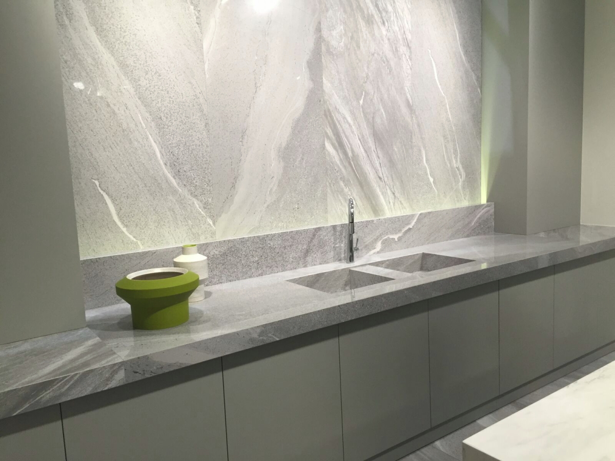 Grey cabinetry meets grey stone