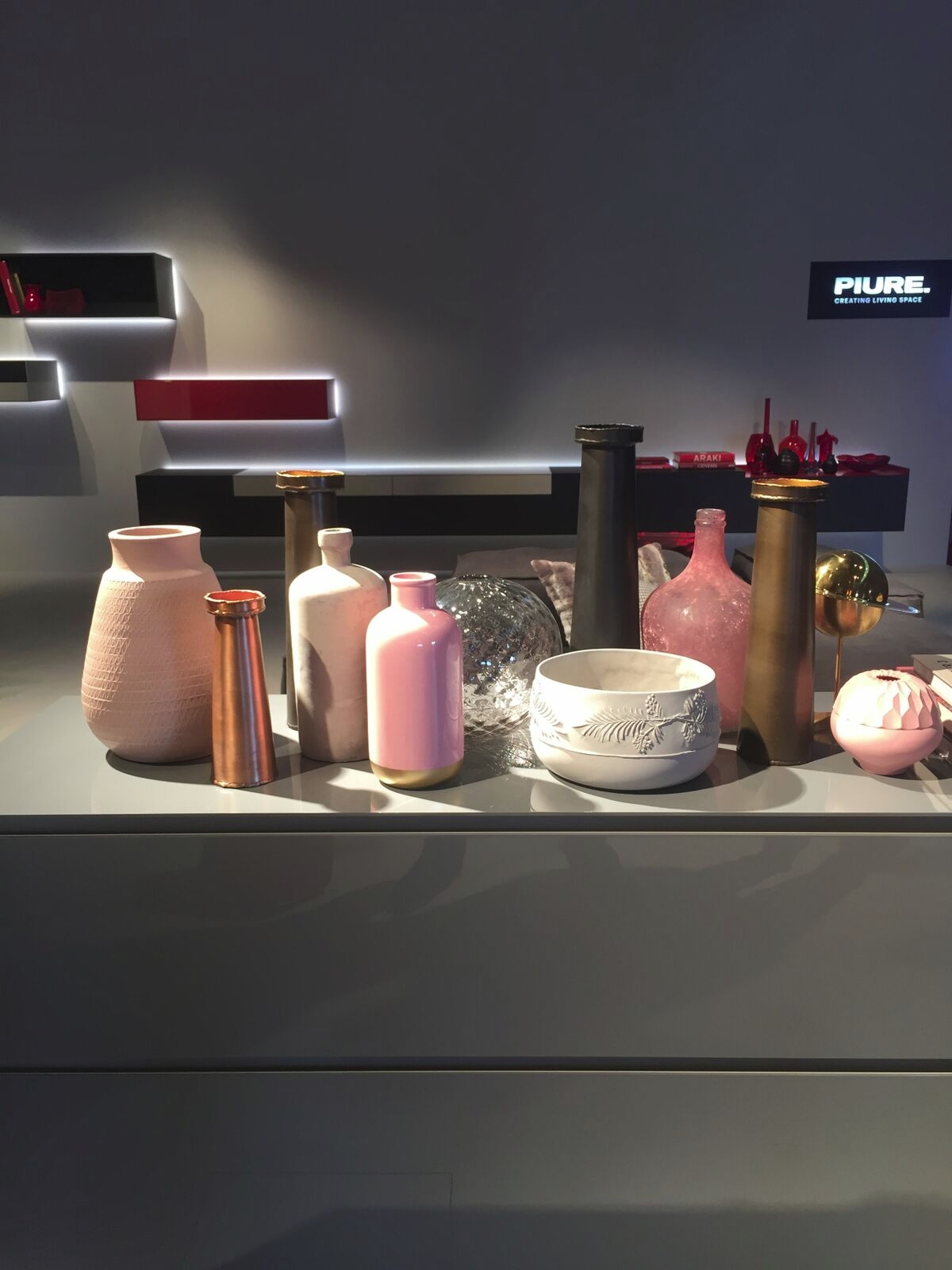 Layering vases in rosy shades