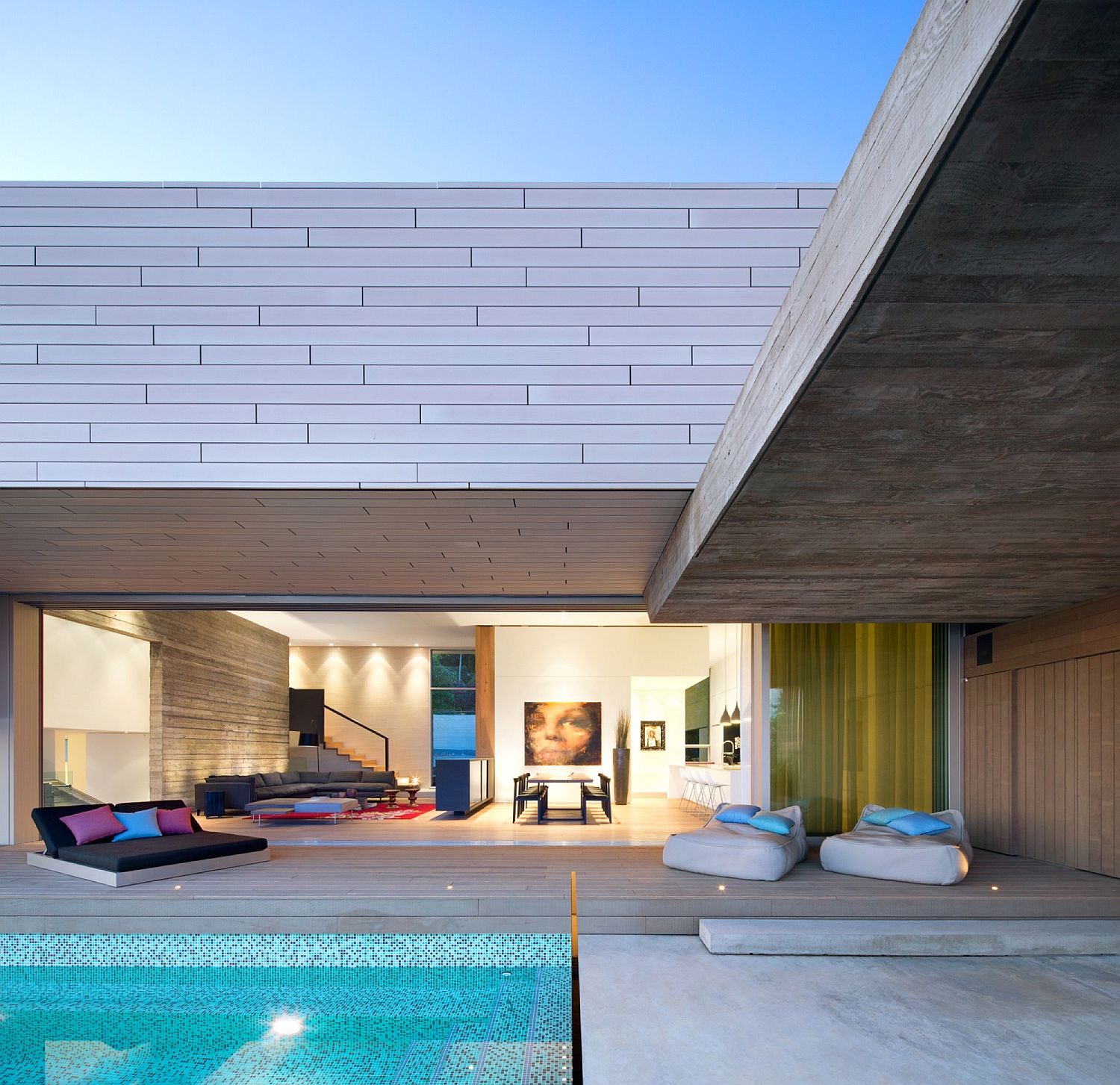 Deck and pool area of the dashing Sunset House in Canada