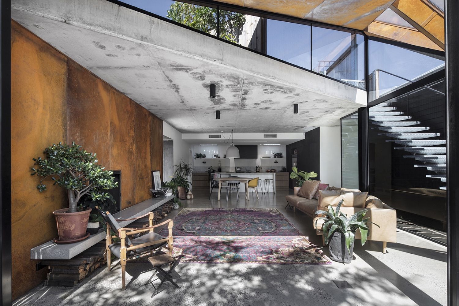 Open living with glass and green roof is a showstopper