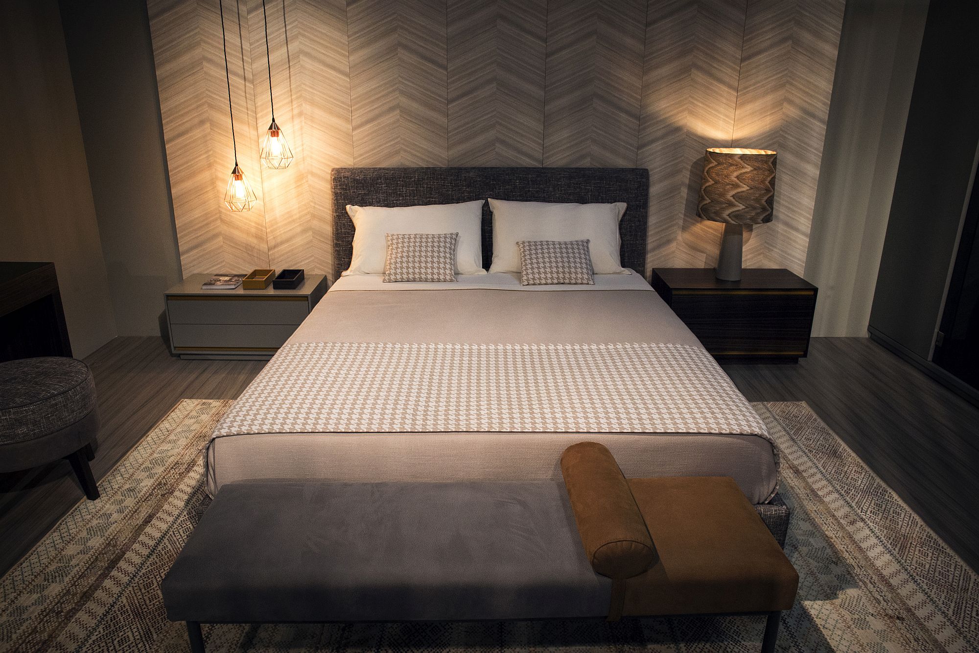 Chevron pattern in the backdrop adds to the geo style of the bedroom