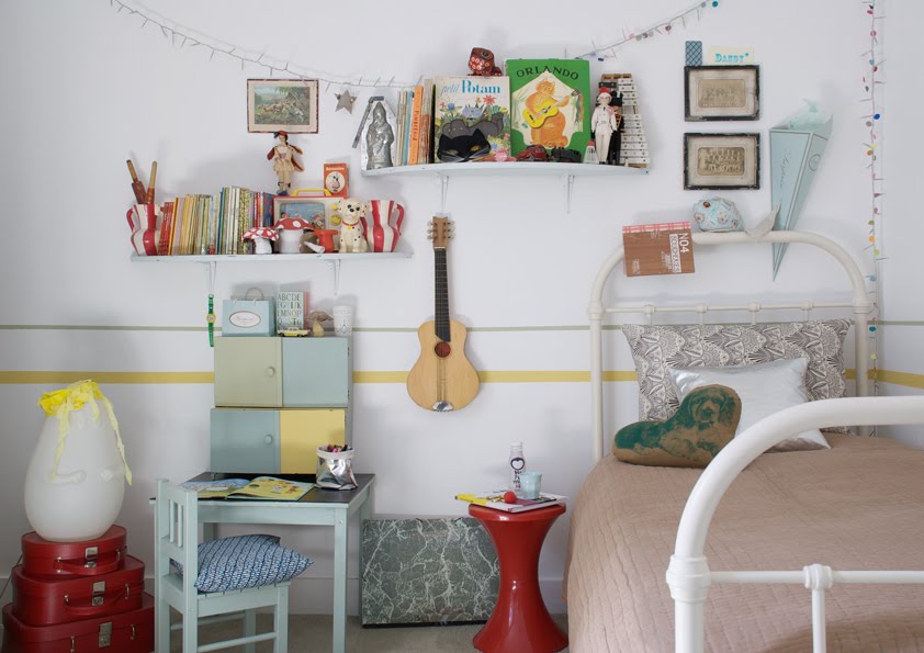 Vintage kids room with beautiful outdated pastel pieces