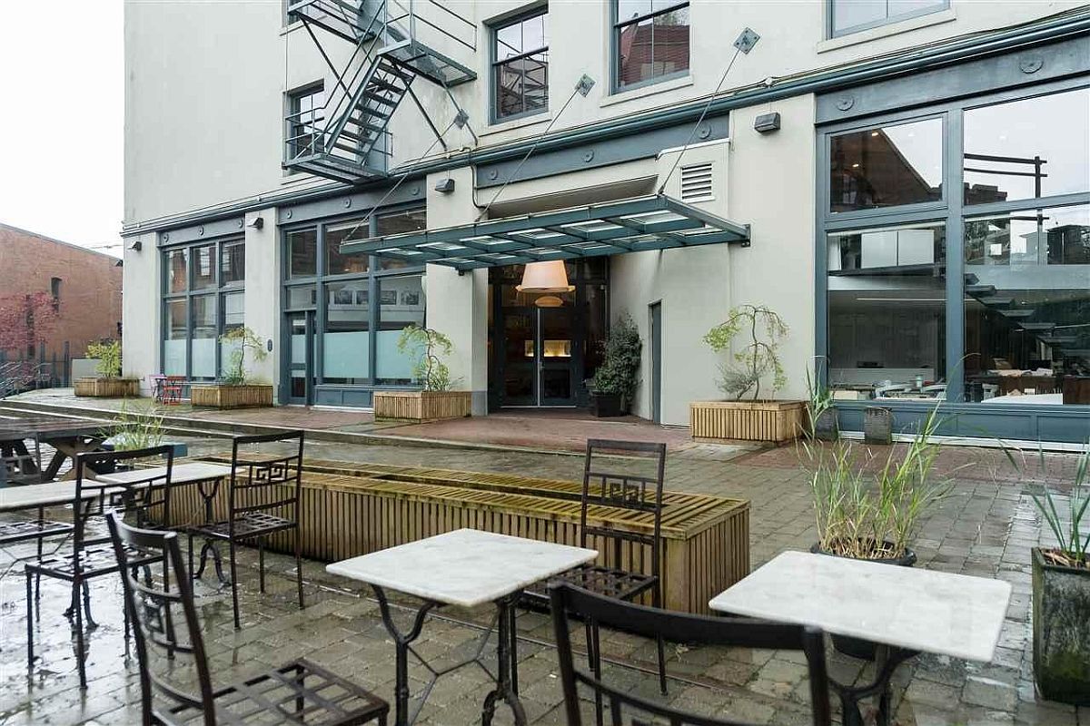 Sitting space outside the converted warehouse building