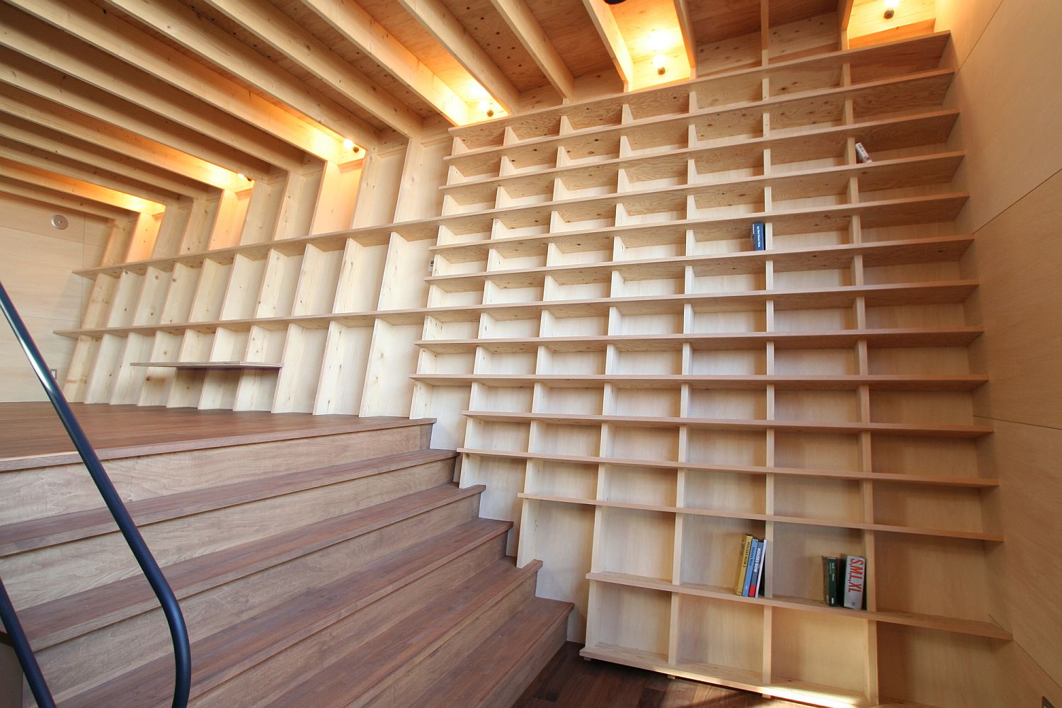 Giant bookshelf wall goes beyond the mundane