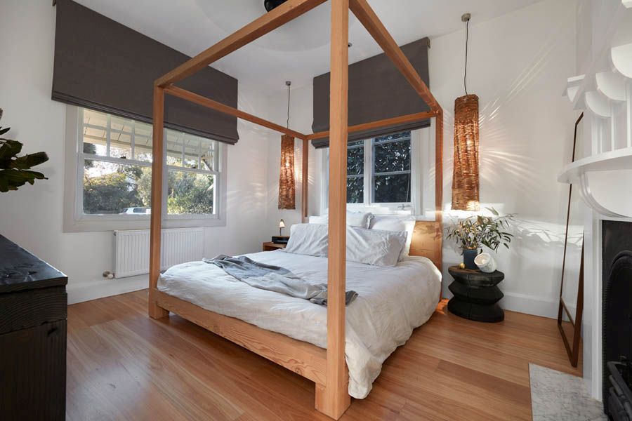 Bedroom inside the heritage structure of the revamped Aussie home