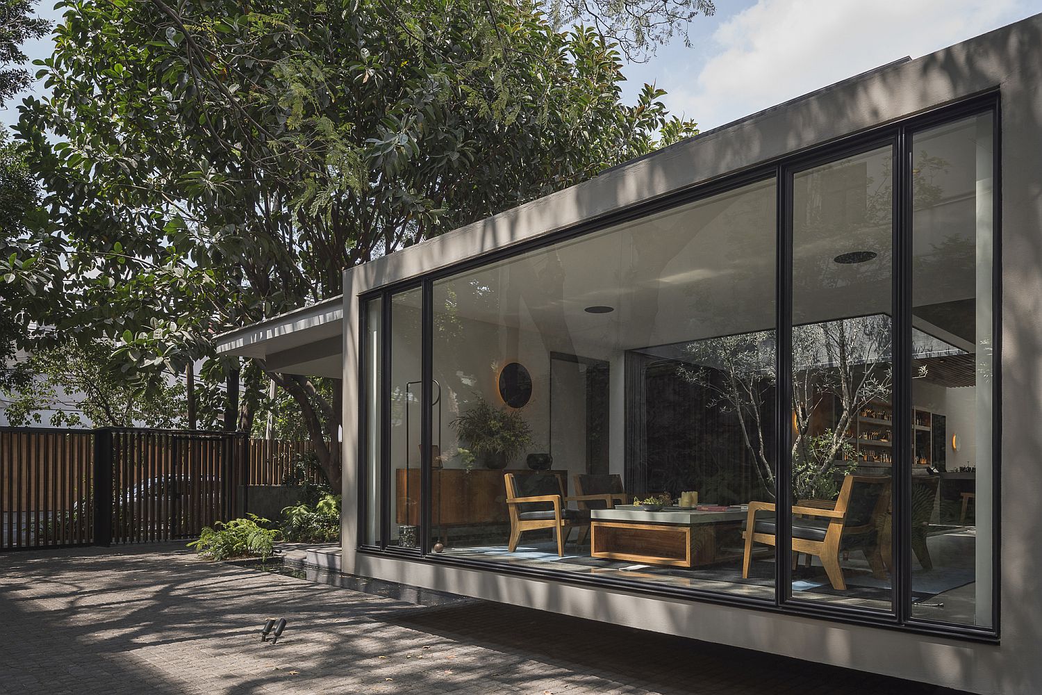 Large sliding glass doors and walls connect the restaurant with the outdoors